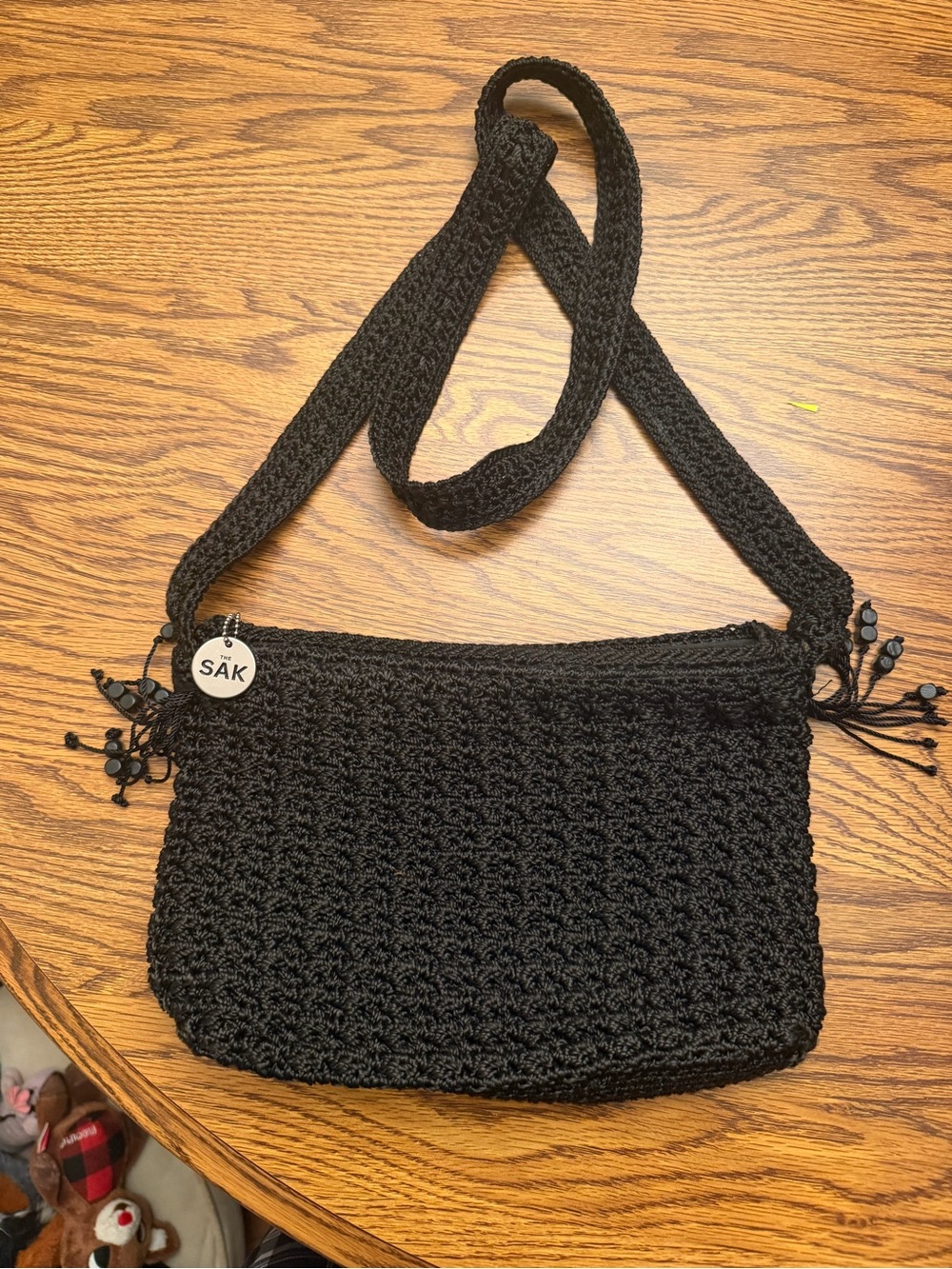 The Sak Black Crocheted Crossbody with Bead Tassels